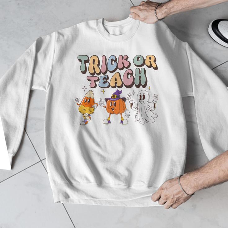 Trick Or Teach Candy Corn Pumpkin Ghost Teacher Men Graphic Sweatshirt, funny design Trick Or Teach Candy Corn Pumpkin Ghost Teacher Men Graphic Sweatshirt, funny design