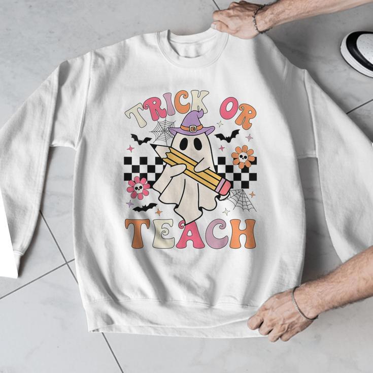 Trick Or Teach Groovy Teacher Halloween Retro Floral Ghost Men Graphic Sweatshirt, Groovy Teacher Gifts, funny design