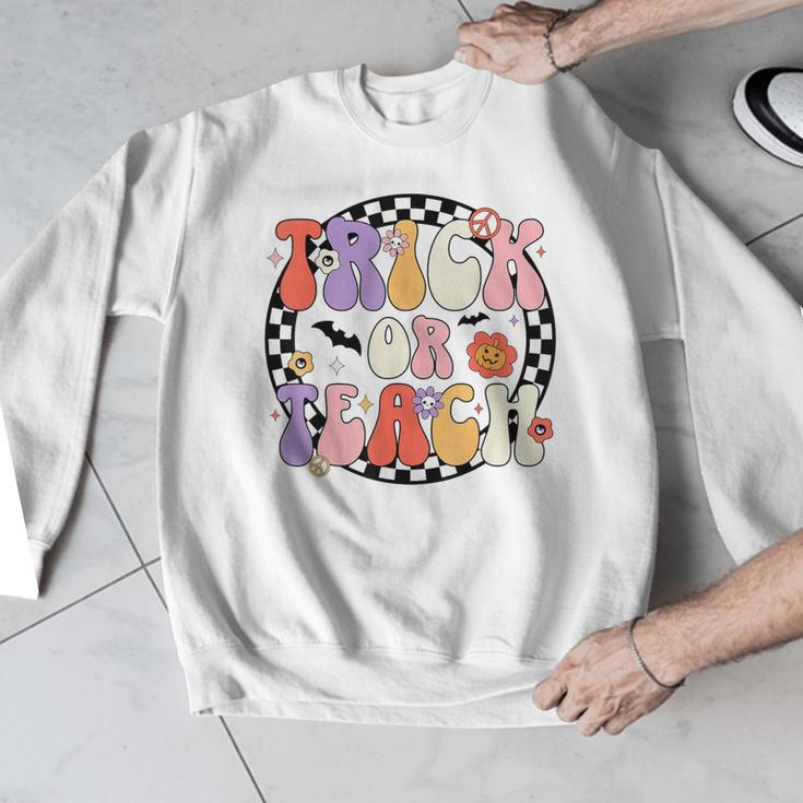 Trick Or Teach Retro Groovy Halloween Teacher Men Graphic Sweatshirt, Groovy Teacher Gifts, funny design Trick Or Teach Retro Groovy Halloween Teacher Men Graphic Sweatshirt, Groovy Teacher Gifts, funny design