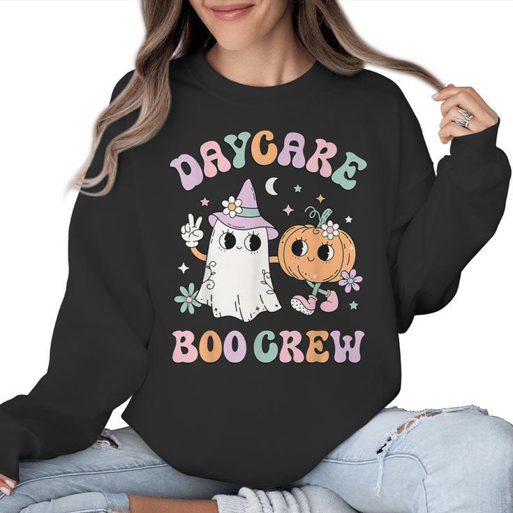 Daycare Boo Crew Groovy Halloween Floral Ghost Kid Teacher Women Crewneck Sweatshirt