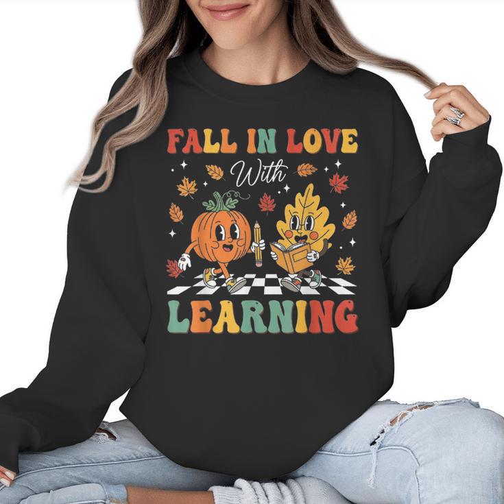 Groovy Fall In Love With Learning Autumn Pumpkin Teacher Women Crewneck Sweatshirt