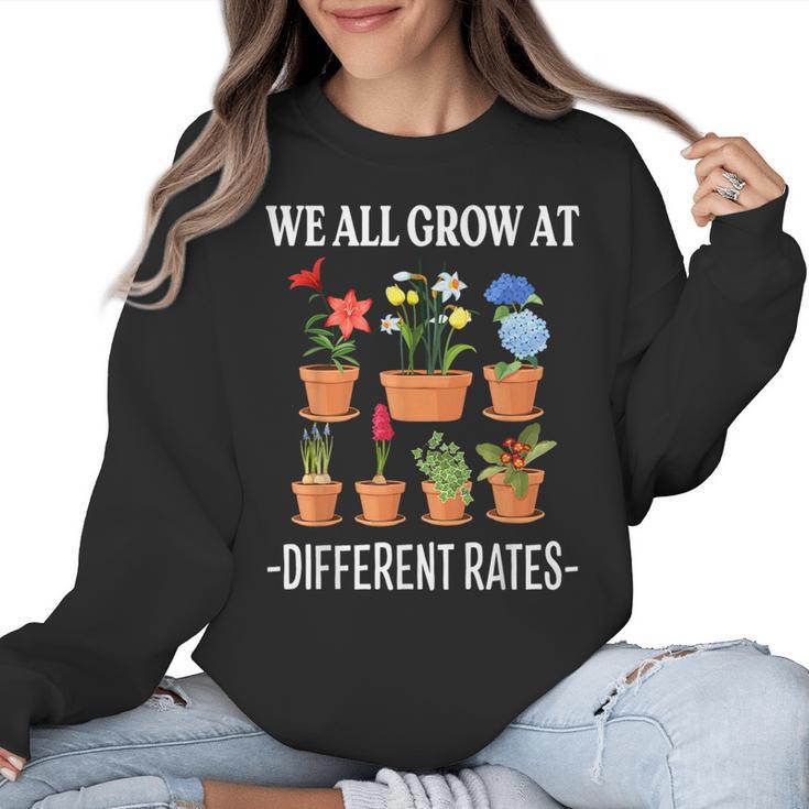 We All Grow At Different Rates Back To School Teacher Women Crewneck Sweatshirt