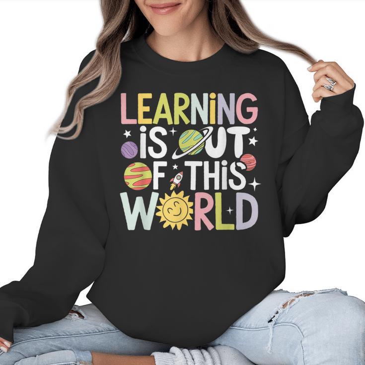Learning Is Out Of This World Space Teacher Cute Groovy Women Crewneck Sweatshirt