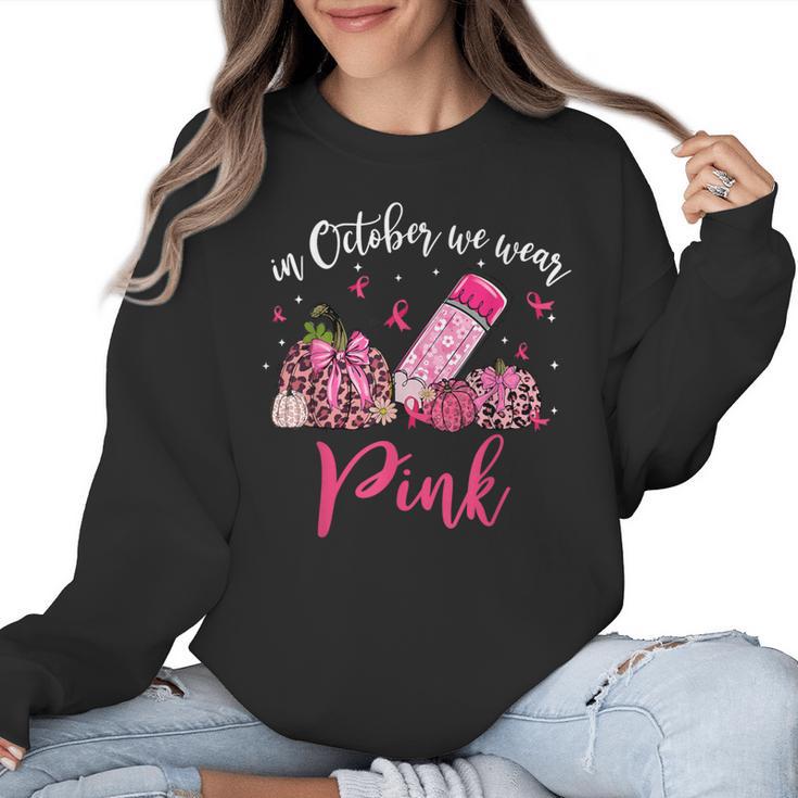 In October We Wear Pink Apple Teacher Daisy Breast Cancer Women Crewneck Sweatshirt