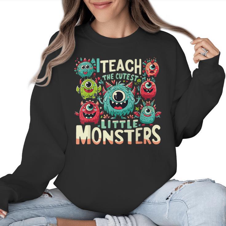 I Teach The Cutest Little Monsters Teacher Halloween Outfit Women Crewneck Sweatshirt