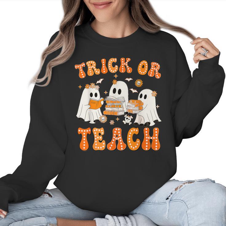 Teacher Halloween Trick Or Teach Retro Groovy Floral Ghost Women Crewneck Sweatshirt