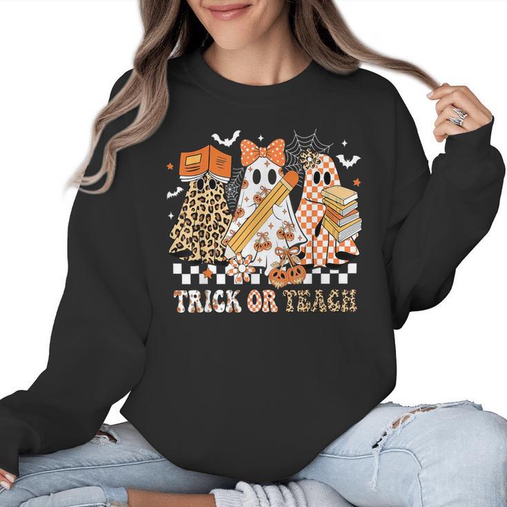 Trick Or Teach Groovy Teacher Halloween Floral Ghost Women Crewneck Sweatshirt