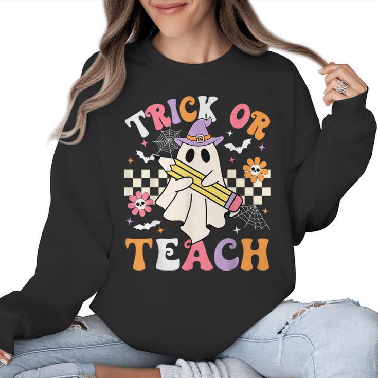 Trick Or Teach Groovy Teacher Halloween Retro Teacher Ghost Women Crewneck Sweatshirt