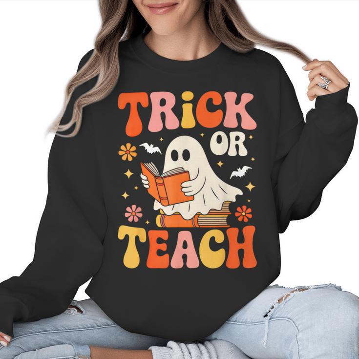 Trick Or Teach Halloween Shirt For Teacher Kids Floral Ghost Women Crewneck Sweatshirt