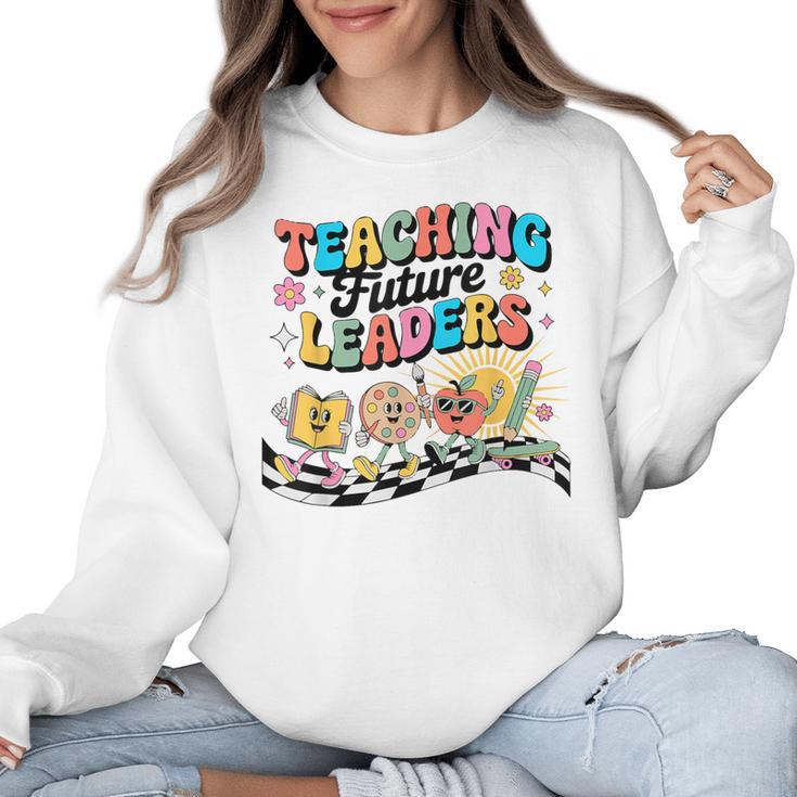 Retro Teaching Future Leaders Groovy Teacher Back To School Women Crewneck Sweatshirt