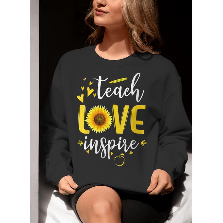 Back To School Teach Love And Inspire Teacher Sunflower Women Crewneck Sweatshirt, funny gift Back To School Teach Love And Inspire Teacher Sunflower Women Crewneck Sweatshirt, funny gift