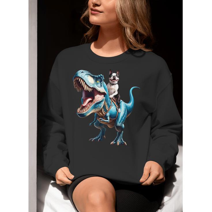Boston Terrier Riding T-Rex Dinosaur Dog Lover Women Crewneck Sweatshirt, Boston Terrier Riding Sweatshirts, funny gift
