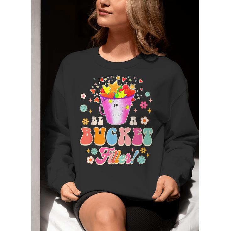 Be A Bucket Filler Teacher Teaching Groovy Back To School For Men Women Women Crewneck Sweatshirt, Groovy Teacher Sweatshirts, funny gift Be A Bucket Filler Teacher Teaching Groovy Back To School For Men Women Women Crewneck Sweatshirt, Groovy Teacher Sweatshirts, funny gift
