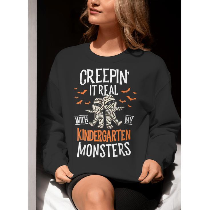 Creepin It Real Kindergarten Monsters Halloween Teacher Women Crewneck Sweatshirt, funny gift Creepin It Real Kindergarten Monsters Halloween Teacher Women Crewneck Sweatshirt, funny gift