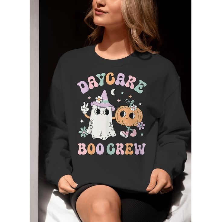 Daycare Boo Crew Groovy Halloween Floral Ghost Kid Teacher Women Crewneck Sweatshirt, Groovy Teacher Sweatshirts, funny gift