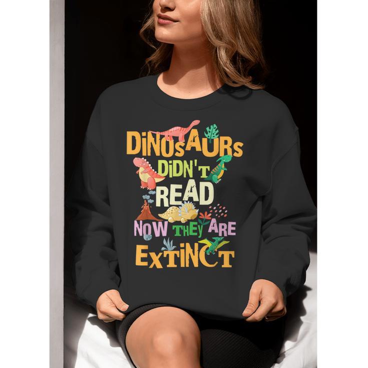 Dinosaurs Didn't Read Now They Are Extinct Reading Teacher Women Crewneck Sweatshirt, funny gift Dinosaurs Didn't Read Now They Are Extinct Reading Teacher Women Crewneck Sweatshirt, funny gift