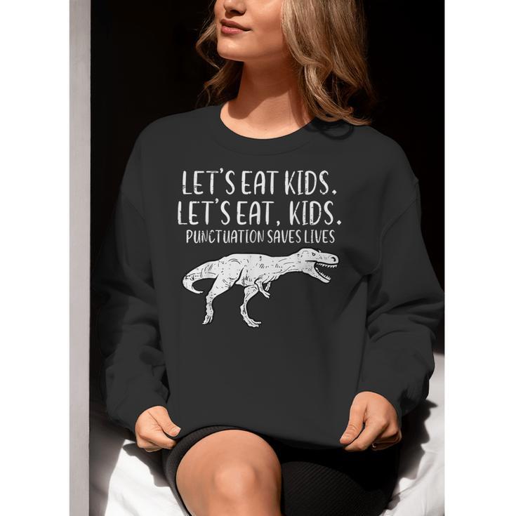 Lets Eat Kids Punctuation Saves Lives Dino Teacher Men Women Crewneck Sweatshirt, funny gift