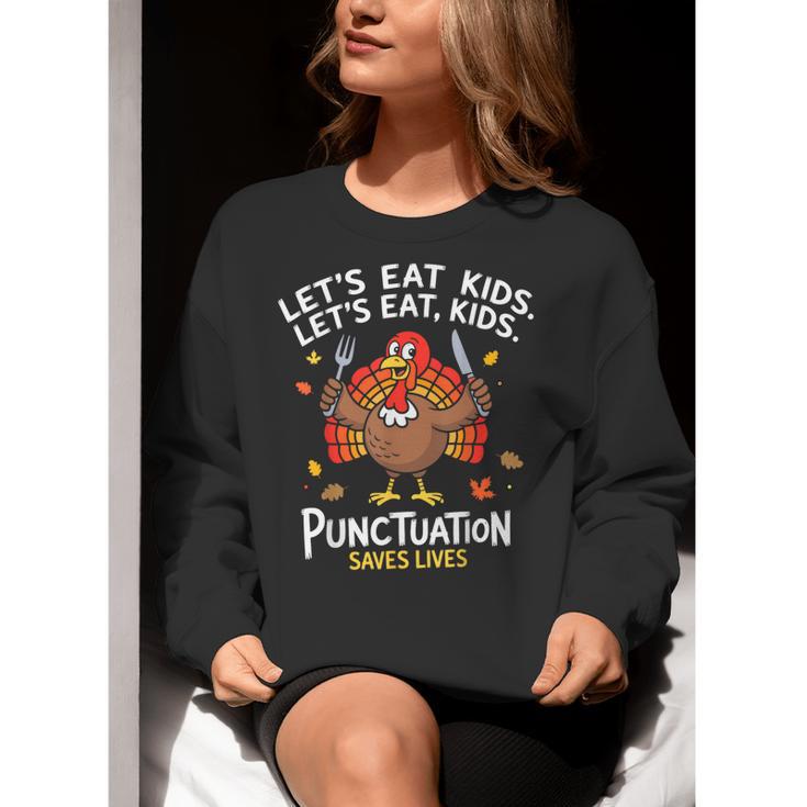 Lets Eat Kids Punctuation Saves Lives Thanksgiving Teacher Women Crewneck Sweatshirt, funny gift