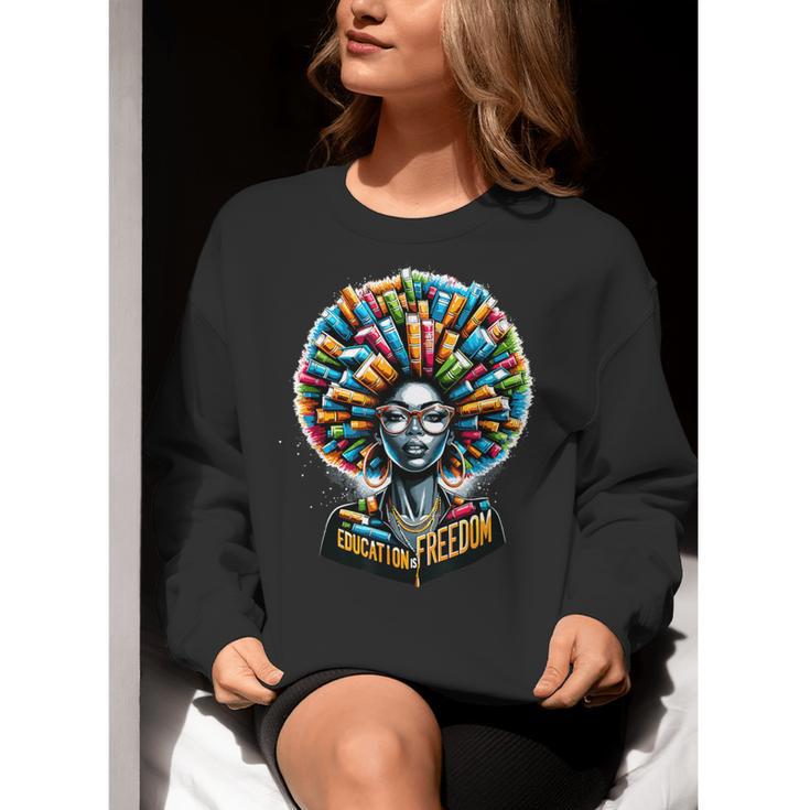 Education Is Freedom History Month Teacher Books Afro Women Crewneck Sweatshirt, History Teacher Sweatshirts, funny gift