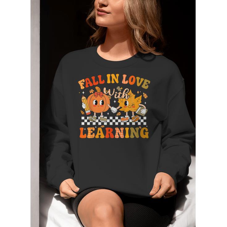 Fall In Love With Learning Autumn Pumpkin Fall Teacher Kids Women Crewneck Sweatshirt, funny gift
