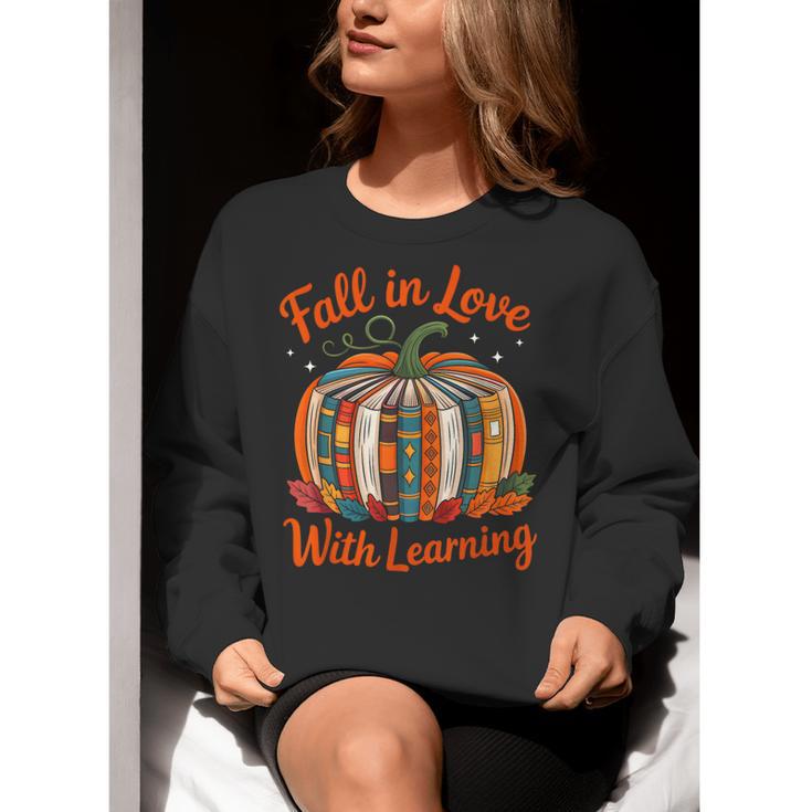 Fall In Love With Learning Book Lover Autumn Pumpkin Teacher Women Crewneck Sweatshirt, funny gift Fall In Love With Learning Book Lover Autumn Pumpkin Teacher Women Crewneck Sweatshirt, funny gift