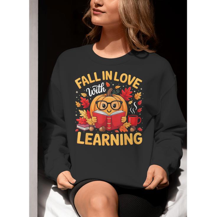 Fall In Love With Learning Pumpkin Thanksgiving Teacher Fall Women Crewneck Sweatshirt, funny gift Fall In Love With Learning Pumpkin Thanksgiving Teacher Fall Women Crewneck Sweatshirt, funny gift