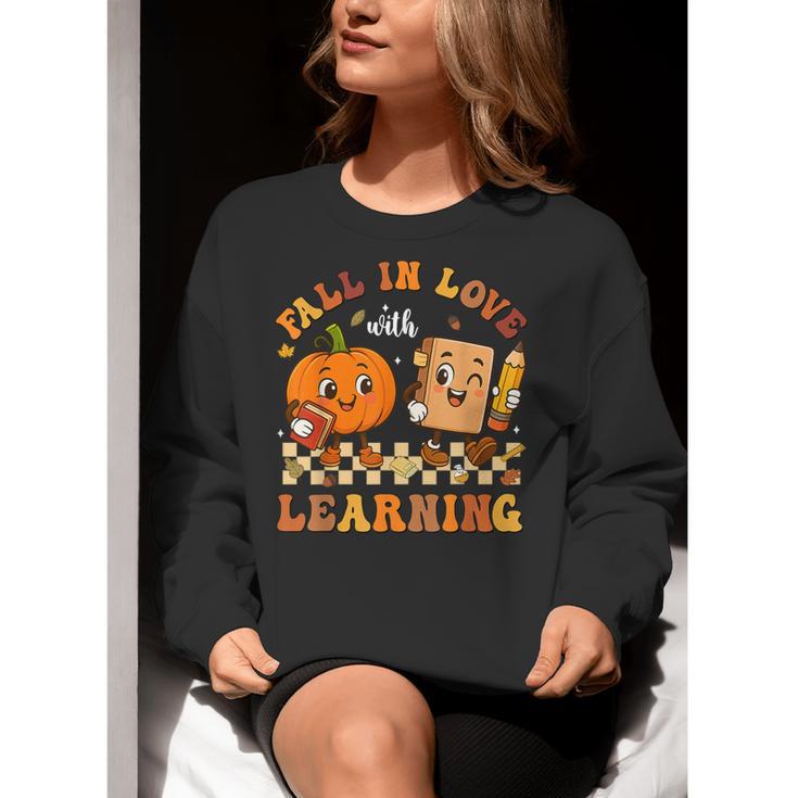 Fall In Love With Reading Book Autumn Pumpkins And Teachers Women Crewneck Sweatshirt, funny gift Fall In Love With Reading Book Autumn Pumpkins And Teachers Women Crewneck Sweatshirt, funny gift