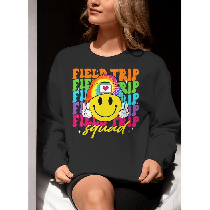 Field Trip Squad Groovy Field Day Smile Face Teacher Tie Dye Women Crewneck Sweatshirt, Groovy Teacher Sweatshirts, funny gift