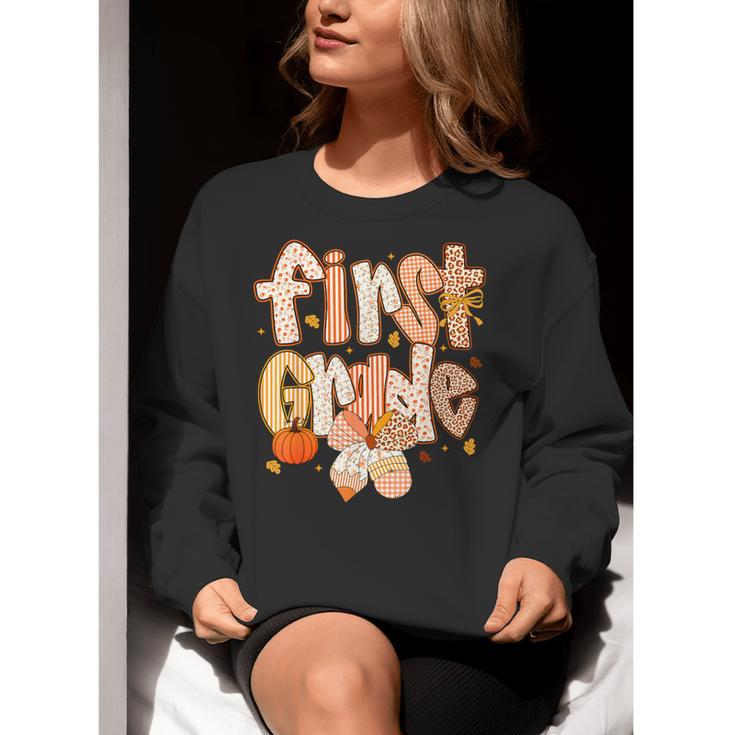 First Grade Fall Floral Coquette Bow Teachers Students Women Crewneck Sweatshirt, First Grade Teacher Sweatshirts, funny gift First Grade Fall Floral Coquette Bow Teachers Students Women Crewneck Sweatshirt, First Grade Teacher Sweatshirts, funny gift