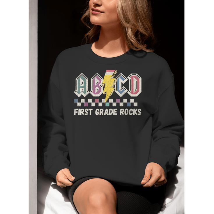 First Grade Rocks Teachers Back To School ABCD Rock Students Women Crewneck Sweatshirt, First Grade Teacher Sweatshirts, funny gift