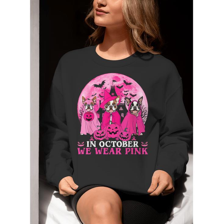 Ghost And Witch Boston Terrier Dog In October We Wear Pink Women Crewneck Sweatshirt, Boston Terrier Ghost Sweatshirts, funny gift