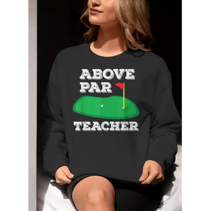Golf Pun Above Par Teacher School Golfing Men & Women Women Crewneck Sweatshirt, funny gift