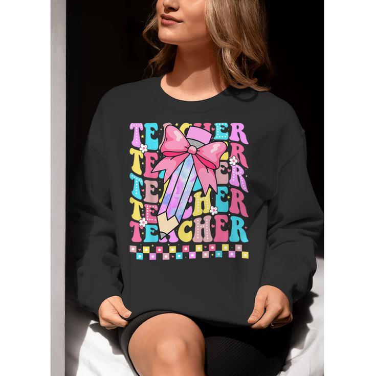 Groovy Teacher Cute Coquette Bow Flower Retro Back To School Women Crewneck Sweatshirt, Groovy Teacher Sweatshirts, funny gift Groovy Teacher Cute Coquette Bow Flower Retro Back To School Women Crewneck Sweatshirt, Groovy Teacher Sweatshirts, funny gift