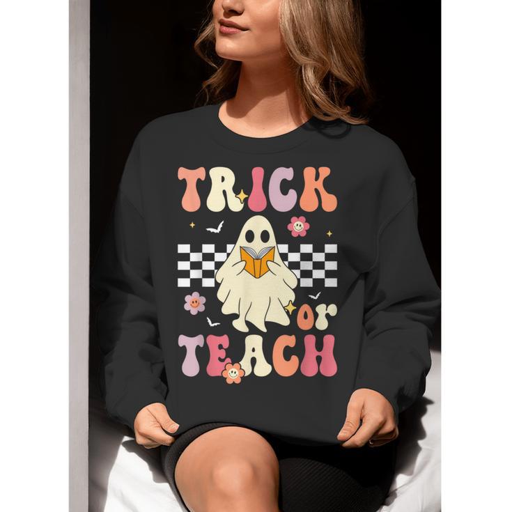 Groovy Teacher Halloween Retro Trick Or Teach Floral Ghost Women Crewneck Sweatshirt, Groovy Teacher Sweatshirts, funny gift Groovy Teacher Halloween Retro Trick Or Teach Floral Ghost Women Crewneck Sweatshirt, Groovy Teacher Sweatshirts, funny gift