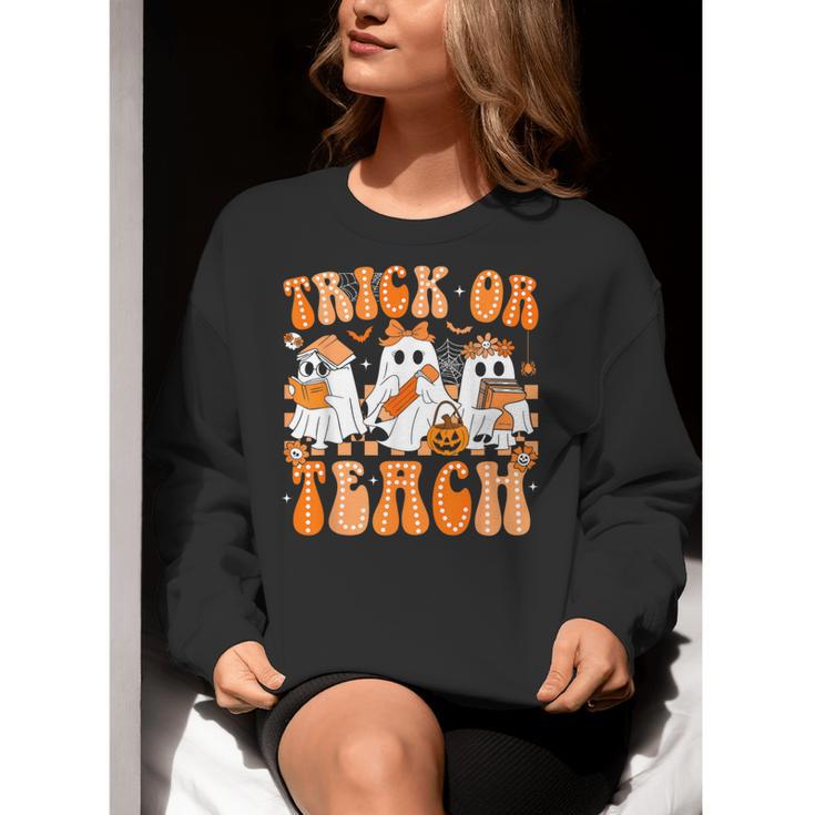 Groovy Teacher Halloween Trick Or Teach Ghost Men Women Kids Women Crewneck Sweatshirt, Groovy Teacher Sweatshirts, funny gift