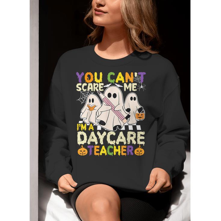 Halloween You Can't Scare Me I'm a Daycare Teacher Ghost Women Crewneck Sweatshirt, funny gift