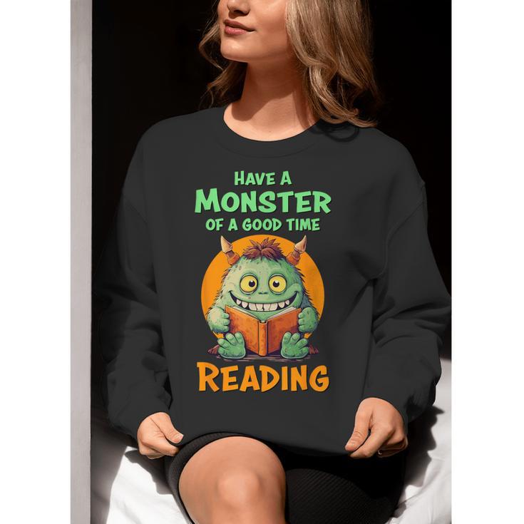 Halloween Teacher Librarian Monster Reading Books Men Women Kids Women Crewneck Sweatshirt, funny gift