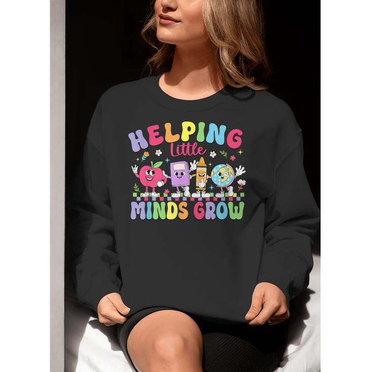 Helping Little Minds Grow Teacher Life Back To School Women Crewneck Sweatshirt, funny gift