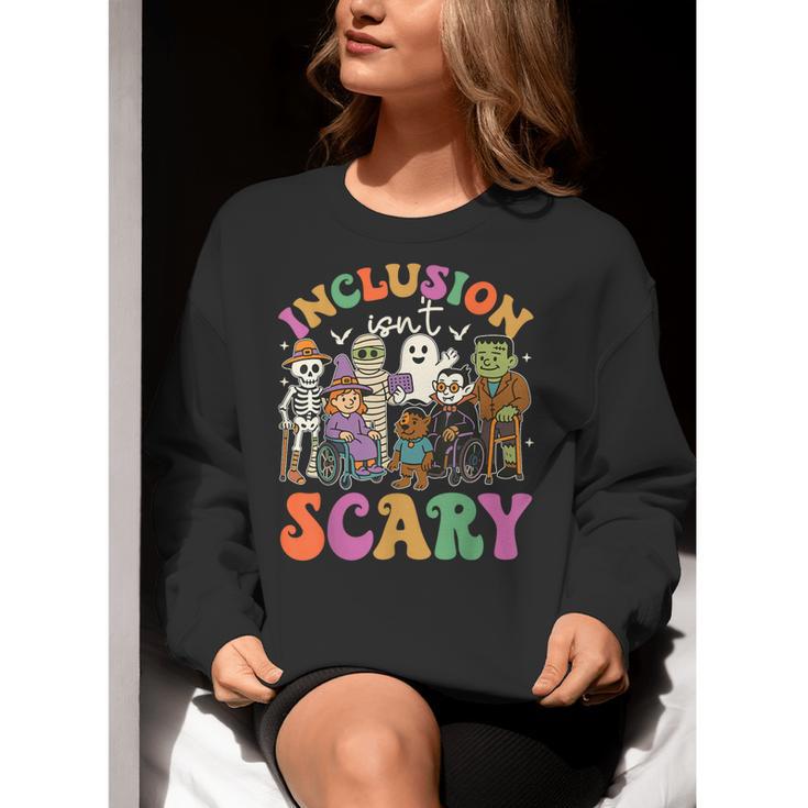 Inclusion Isnt Scary Halloween Skeleton Ghost Sped Teacher Women Crewneck Sweatshirt, funny gift