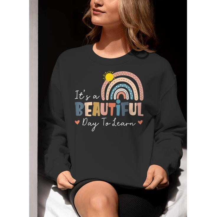 It's A Beautiful Day To Learn Cute Rainbow Boho Teacher Women Crewneck Sweatshirt, funny gift