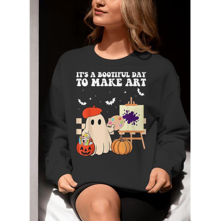 It's A Bootiful Day To Make Art Groovy Art Teacher Halloween Women Crewneck Sweatshirt, Groovy Teacher Sweatshirts, funny gift