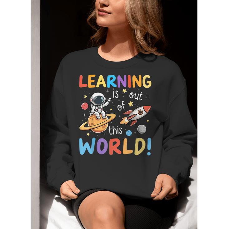 Learning Is Out Of This World Space Back To School Teacher Women Crewneck Sweatshirt, funny gift Learning Is Out Of This World Space Back To School Teacher Women Crewneck Sweatshirt, funny gift