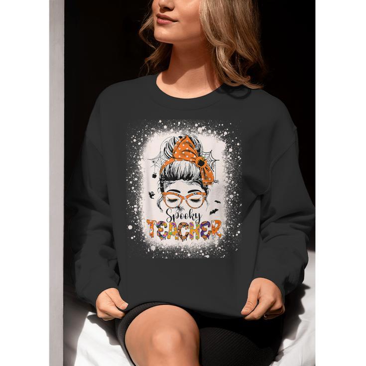 Messy Bun Spooky Teacher Bleached Halloween Teachers Women Crewneck Sweatshirt, funny gift