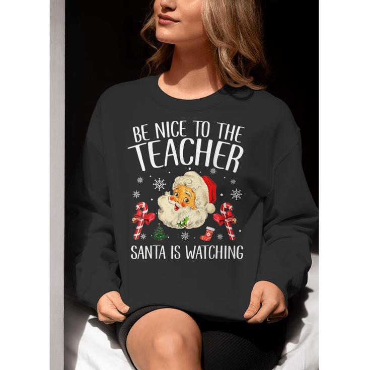 Be Nice To The Teacher Santa Is Watching School Christmas Women Crewneck Sweatshirt, funny gift Be Nice To The Teacher Santa Is Watching School Christmas Women Crewneck Sweatshirt, funny gift