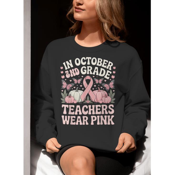 In October 2nd Grade Teachers Wear Pink Ribbon Breast Cancer Women Crewneck Sweatshirt, funny gift In October 2nd Grade Teachers Wear Pink Ribbon Breast Cancer Women Crewneck Sweatshirt, funny gift