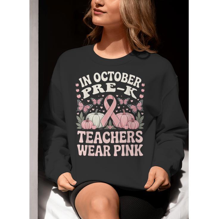 In October Pre-K Teachers Wear Pink Ribbon Breast Cancer Women Crewneck Sweatshirt, funny gift