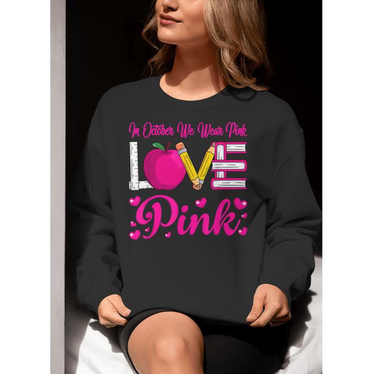 In October We Wear Pink Love Teacher Breast Cancer Awareness Women Crewneck Sweatshirt, funny gift