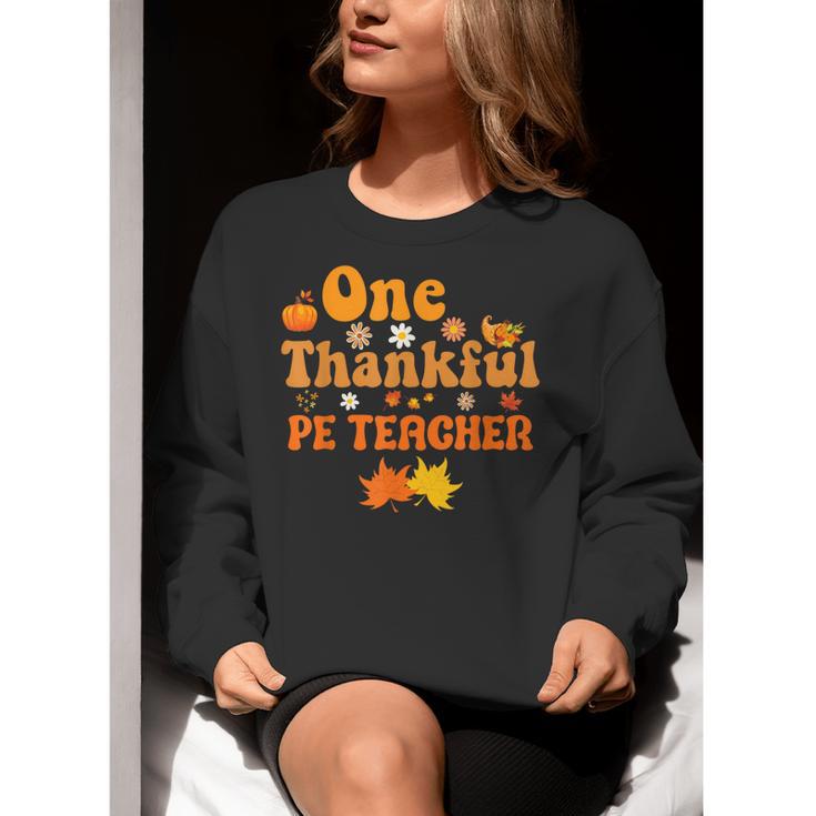 One Thankful PE Teacher Thanksgiving Fall Autumn Groovy Women Crewneck Sweatshirt, Pe Teacher Sweatshirts, Groovy Teacher Sweatshirts, funny gift One Thankful PE Teacher Thanksgiving Fall Autumn Groovy Women Crewneck Sweatshirt, Pe Teacher Sweatshirts, Groovy Teacher Sweatshirts, funny gift