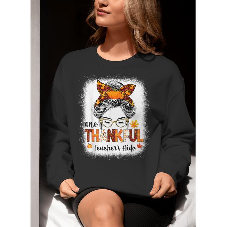 One Thankful Teacher's Aide Messy Bun Thanksgiving Fall Women Crewneck Sweatshirt, funny gift One Thankful Teacher's Aide Messy Bun Thanksgiving Fall Women Crewneck Sweatshirt, funny gift