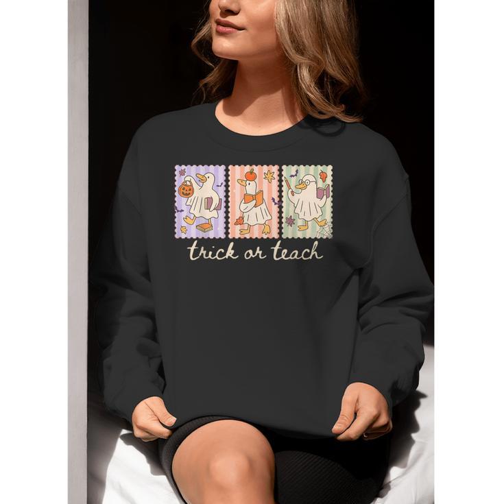 Preppy Goose Teacher Trick Or Teach Halloween Teacher Goose Women Crewneck Sweatshirt, funny gift Preppy Goose Teacher Trick Or Teach Halloween Teacher Goose Women Crewneck Sweatshirt, funny gift